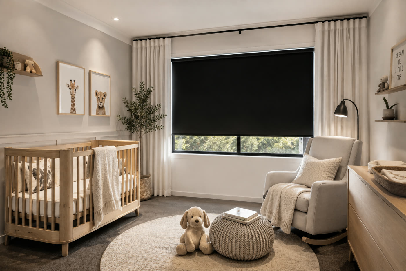 Black blockout roller blind keeping a nursery dark during the day
